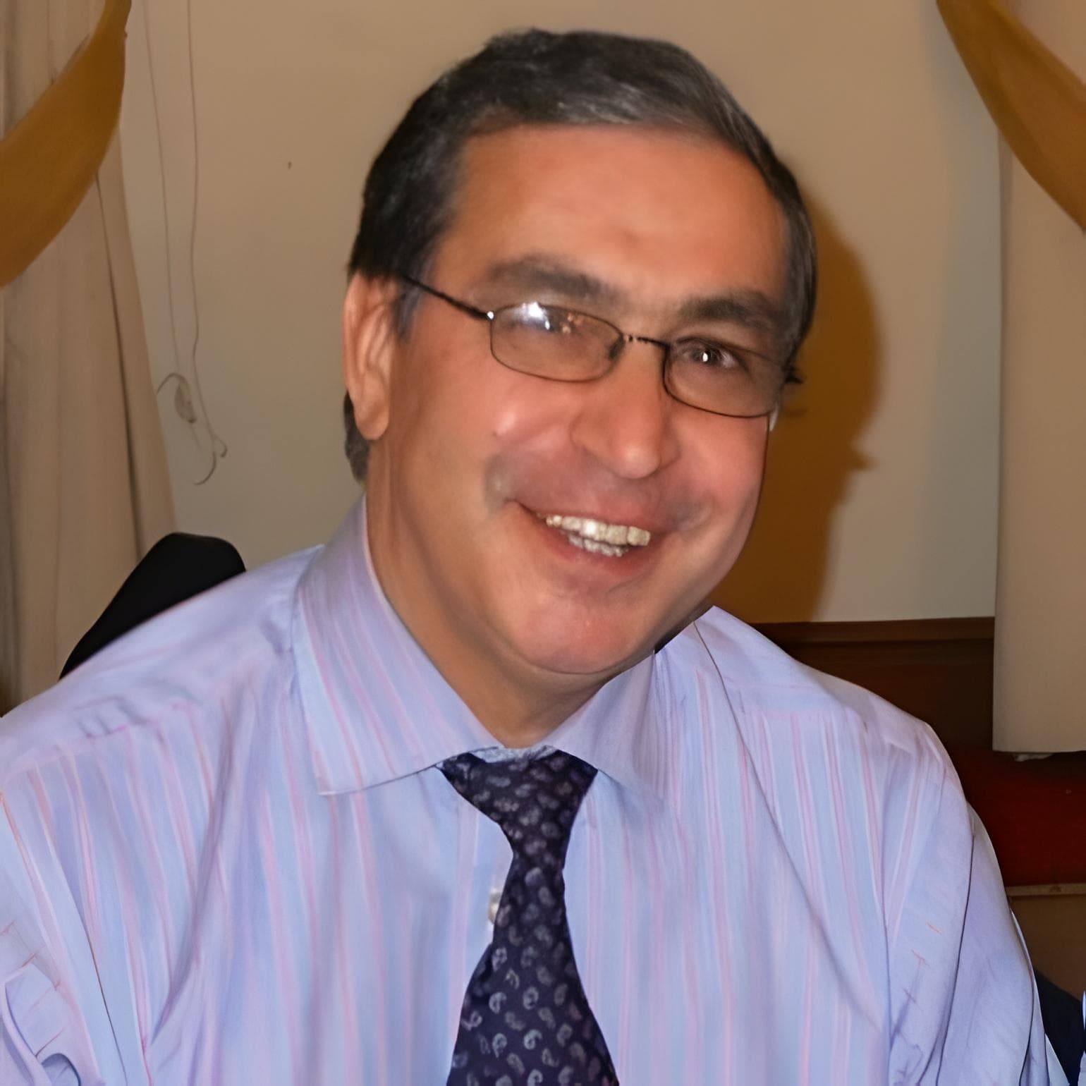 Dr. Arun Midha